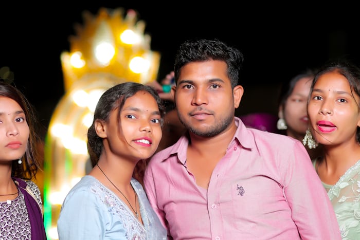 Group of friends celebrating together at a festival gathering