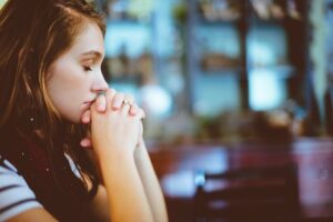 thinking of you messages and prayers with woman praying